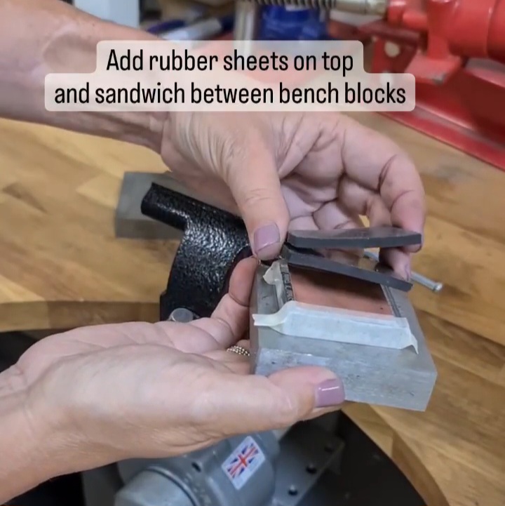 add rubber sheets on top and sandwich between metal bench block